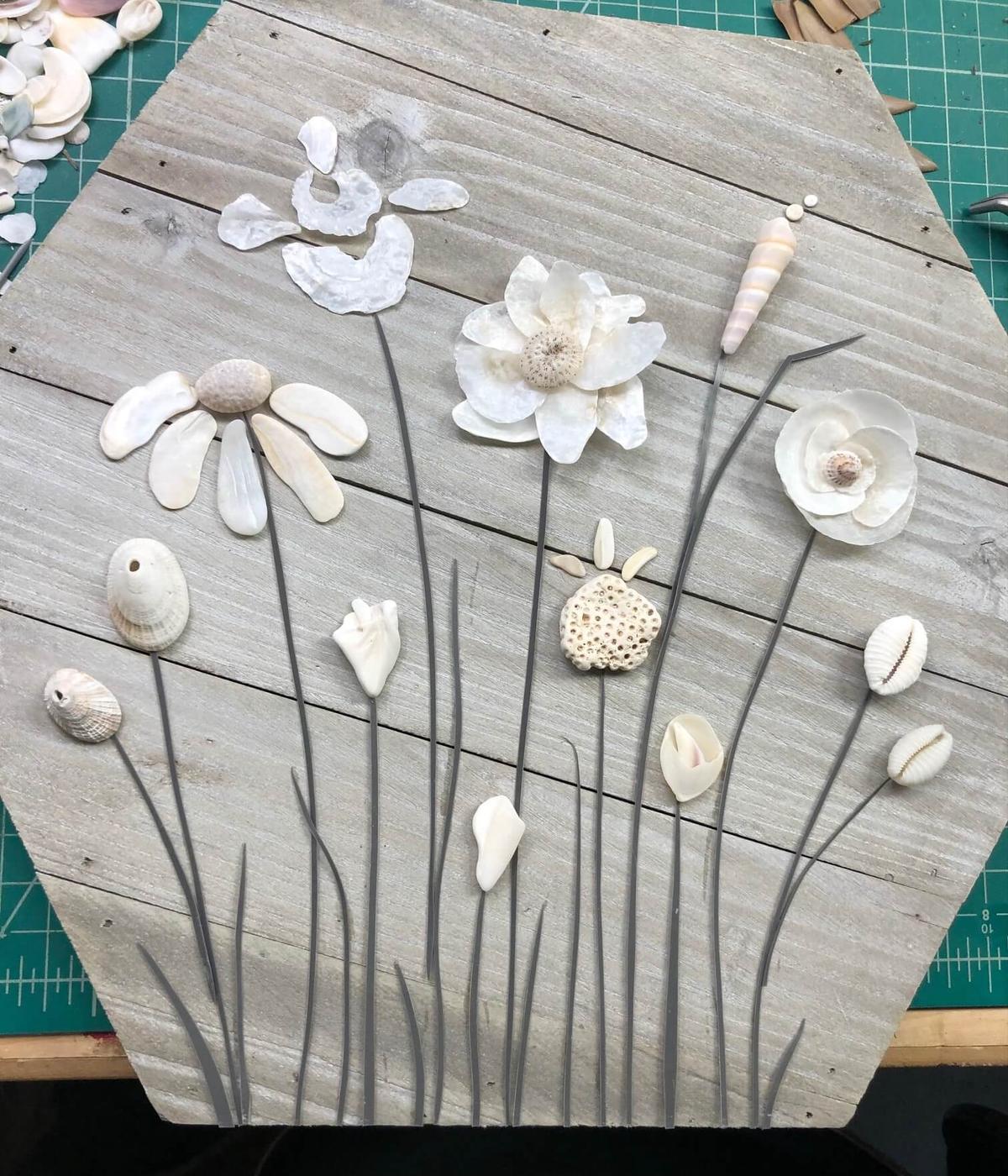 Unique stone and seashell art by red sunset designs
