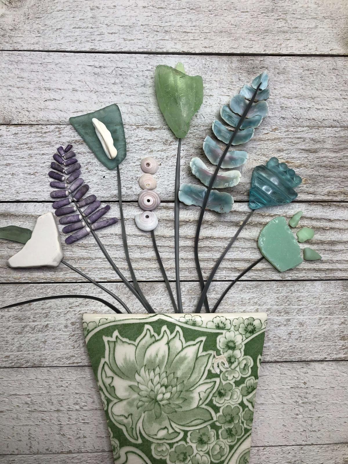 Unique stone and seashell art by red sunset designs